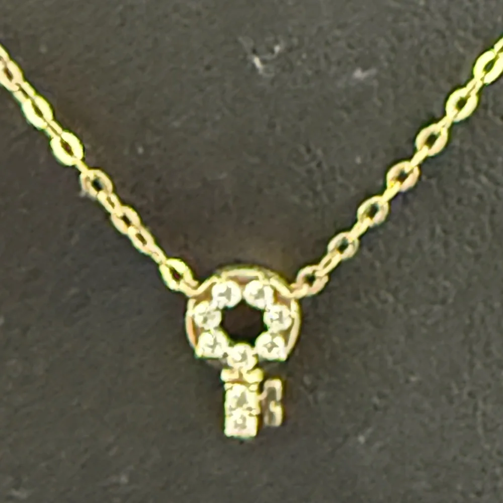 (26)Nadri NEW CZ Key to my heart necklace